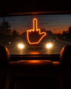 Flip You Light seen from inside the car with a tailgater behind